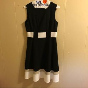 Calvin Klein black and white dress falls above the knee size 4